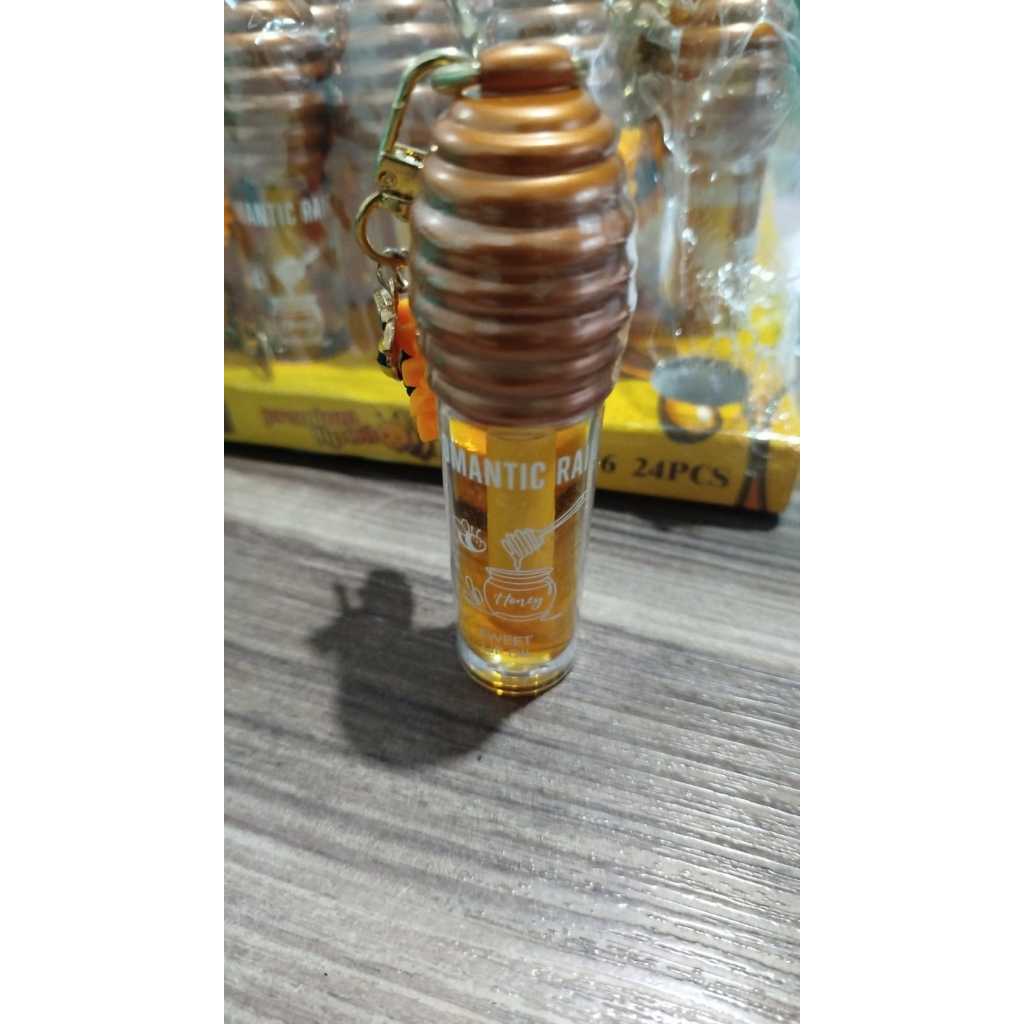 Lip Oil Gloss Hidratante de Mel Romantic Rain com Chaveiro Fofo – Brilho Natural e Hidratação