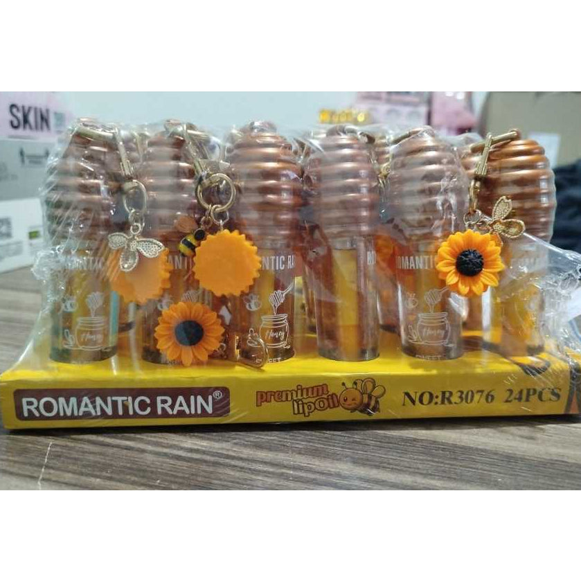 Lip Oil Gloss Hidratante de Mel Romantic Rain com Chaveiro Fofo – Brilho Natural e Hidratação